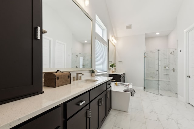 12469 Diamond Creek Dr, Frisco, TX 75035 - bathroom with a marble finish shower, plenty of natural light, vanity, marble finish flooring, and recessed lighting