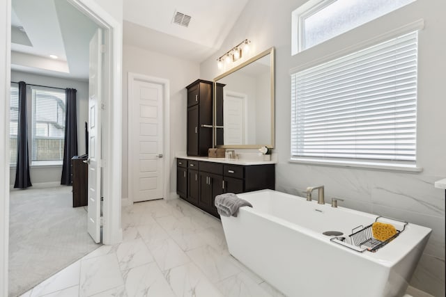 12469 Diamond Creek Dr, Frisco, TX 75035 - full bathroom with a freestanding bath, vanity, healthy amount of natural light, and recessed lighting