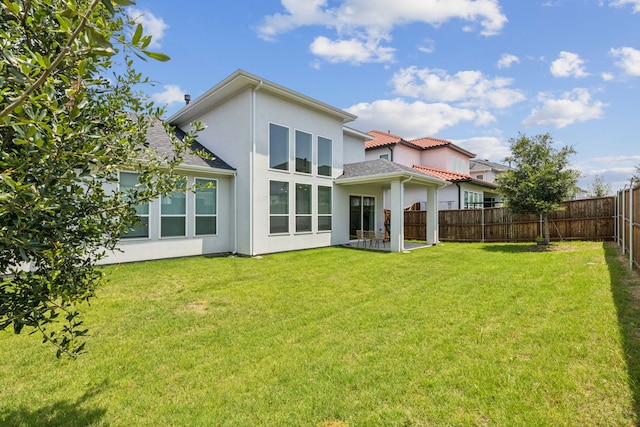 12469 Diamond Creek Dr, Frisco, TX 75035 - rear view of property with stucco siding and a patio