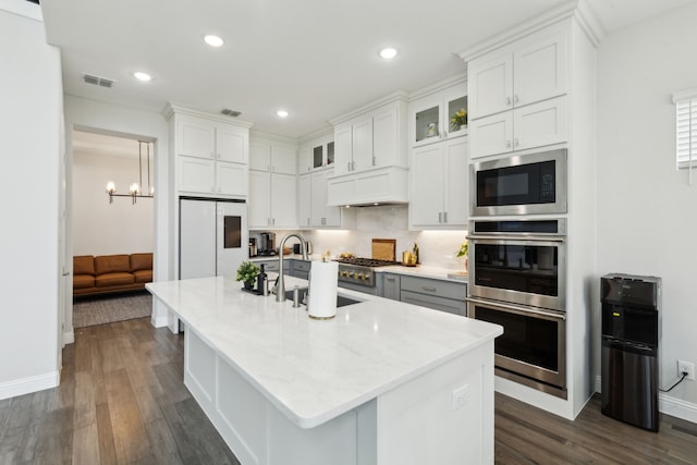 12469 Diamond Creek Dr, Frisco, TX 75035 - kitchen featuring stainless steel appliances, baseboards, a sink, dark wood-style flooring, and recessed lighting