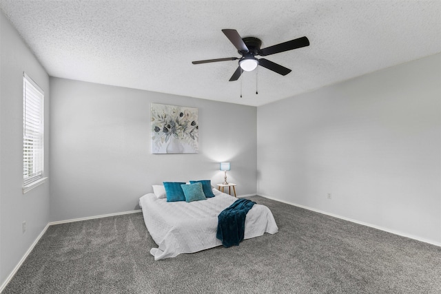 4910 Crest Dr, Arlington, TX 76017 - carpeted bedroom featuring a textured ceiling, ceiling fan, and baseboards