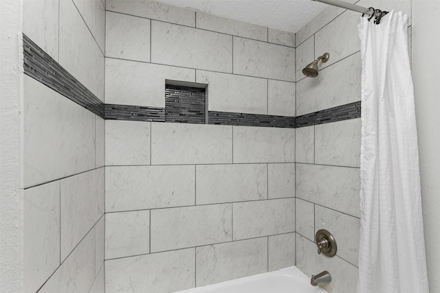 4910 Crest Dr, Arlington, TX 76017 - full bath with shower / bath combination with curtain and a textured ceiling