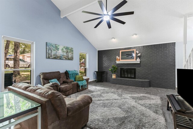 4910 Crest Dr, Arlington, TX 76017 - living room featuring ceiling fan, beam ceiling, high vaulted ceiling, a brick fireplace, and brick wall