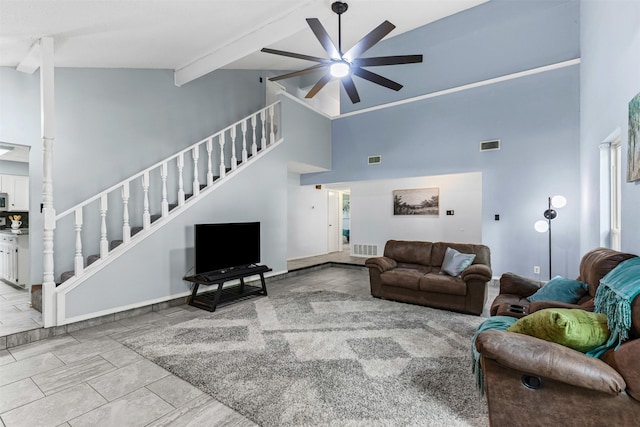 4910 Crest Dr, Arlington, TX 76017 - living room with high vaulted ceiling, stairway, ceiling fan, and beamed ceiling