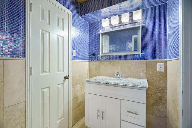6853 Anglebluff Cir, Dallas, TX 75248 - bathroom with tile walls and vanity