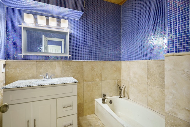 6853 Anglebluff Cir, Dallas, TX 75248 - bathroom featuring tile walls, a bath, and vanity