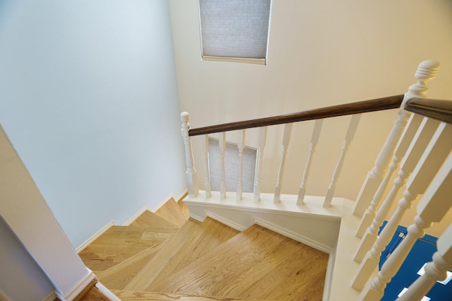 6853 Anglebluff Cir, Dallas, TX 75248 - staircase with wood finished floors