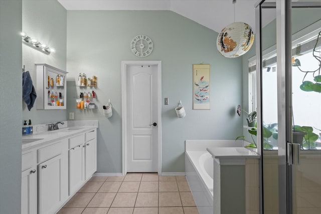 1521 Cherokee Rose Trl, Savannah, TX 76227 - full bath with plenty of natural light, vanity, a bath, tile patterned flooring, and lofted ceiling