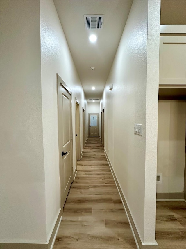 400 N Kenny Dr, West Tawakoni, TX 75474 - hall featuring light wood-type flooring, recessed lighting, and baseboards