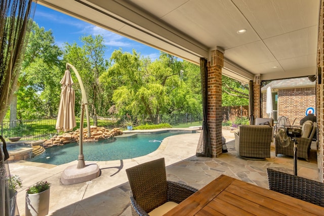 405 Martel Ln, Coppell, TX 75019 - view of swimming pool with a fenced backyard, a patio area, and view of wooded area