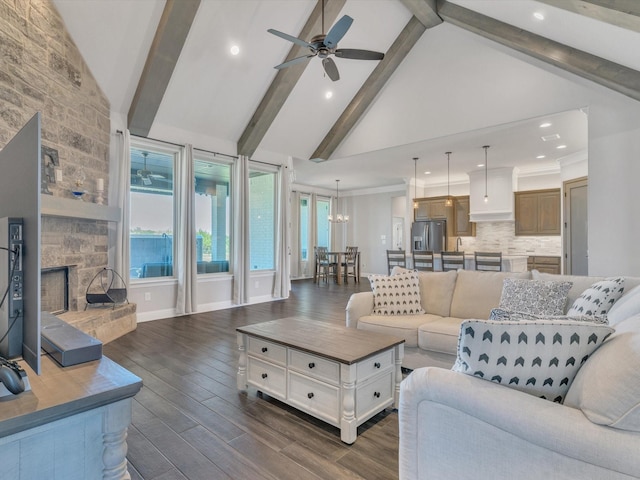 3025 Infinity Dr, Weatherford, TX 76087 - living area with a ceiling fan, beamed ceiling, dark wood finished floors, a fireplace, and recessed lighting