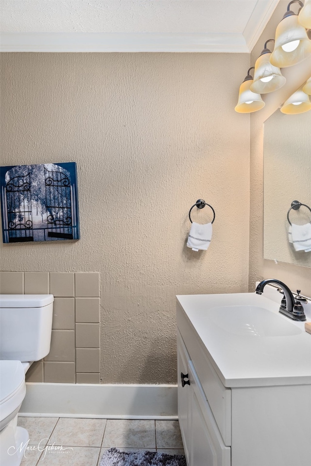 530 Kirby Pl, Shreveport, LA 71104 - bathroom featuring toilet, vanity, ornamental molding, and tile patterned flooring