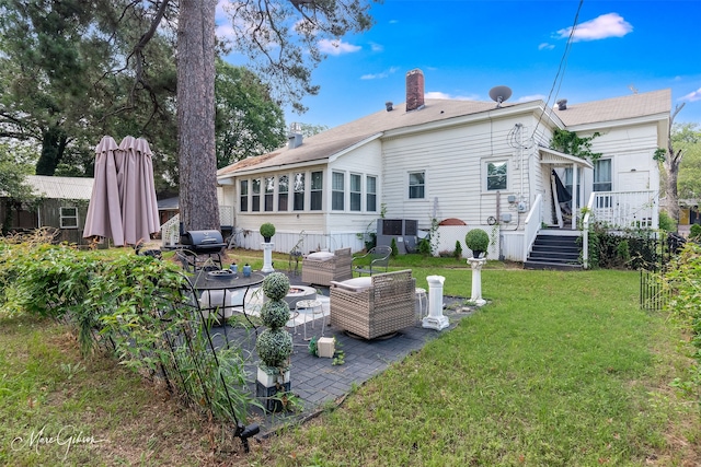 530 Kirby Pl, Shreveport, LA 71104 - back of property with a patio area, a yard, a chimney, and roof with shingles