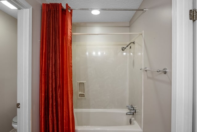 213 County Road 1407, Jacksonville, TX 75766 - full bathroom with shower / tub combo with curtain, a textured ceiling, and toilet