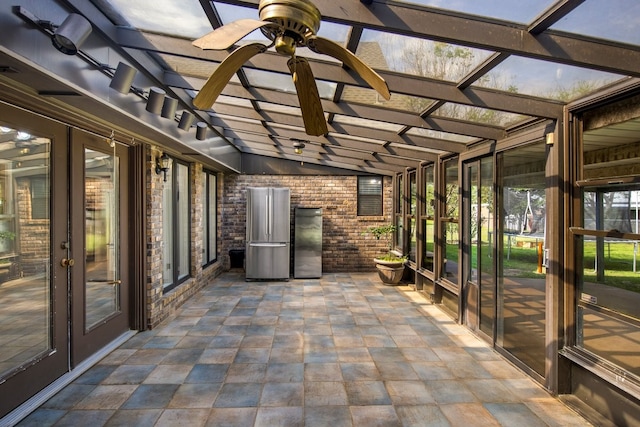 213 County Road 1407, Jacksonville, TX 75766 - unfurnished sunroom with french doors, vaulted ceiling, and ceiling fan