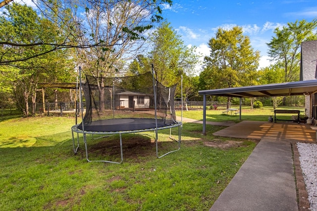 213 County Road 1407, Jacksonville, TX 75766 - view of yard with a trampoline