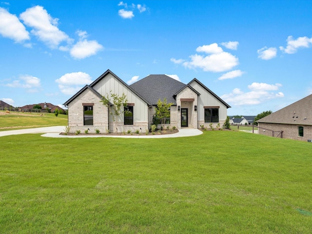 213 Martin Dr, Granbury, TX 76049 - modern farmhouse style home featuring board and batten siding and a front yard