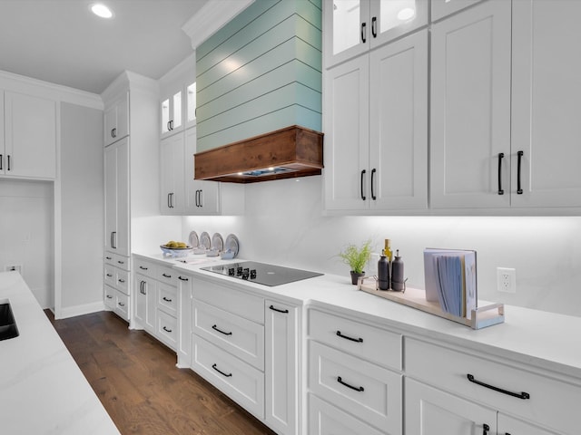 213 Martin Dr, Granbury, TX 76049 - kitchen featuring black electric stovetop, premium range hood, white cabinetry, light countertops, and recessed lighting
