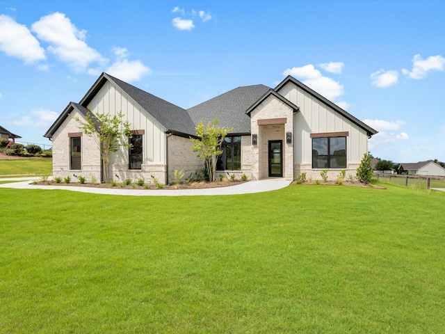 213 Martin Dr, Granbury, TX 76049 - modern farmhouse with board and batten siding and brick siding