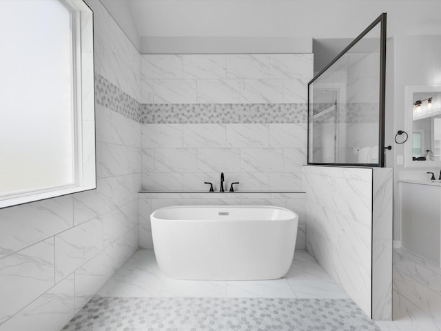 213 Martin Dr, Granbury, TX 76049 - full bathroom with a freestanding tub and a walk in shower