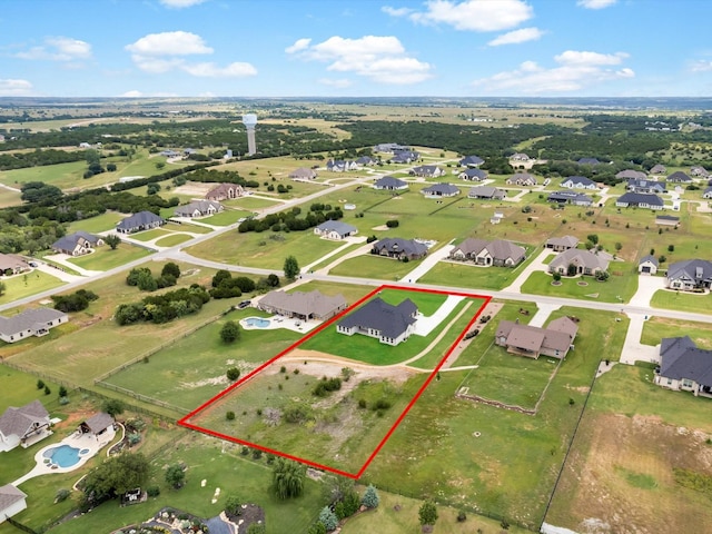 213 Martin Dr, Granbury, TX 76049 - aerial perspective of suburban area featuring property parcel outlined