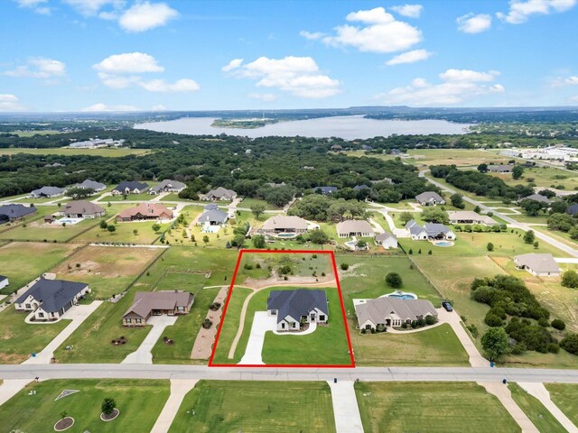 213 Martin Dr, Granbury, TX 76049 - aerial view of residential area with property parcel outlined