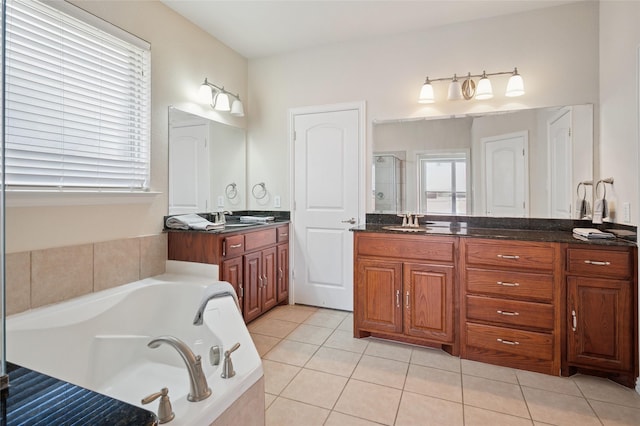 9004 Mcfarland Way, Fort Worth, TX 76244 - full bath featuring plenty of natural light, tile patterned flooring, vanity, and a garden tub