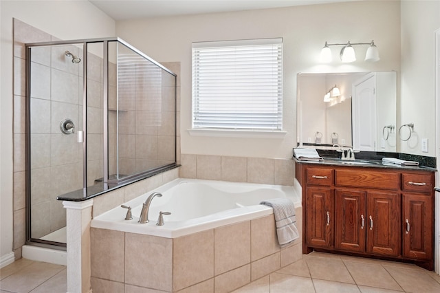9004 Mcfarland Way, Fort Worth, TX 76244 - full bath with vanity, a bath, a shower stall, and tile patterned flooring