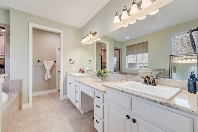1036 Knoxbridge Rd, Forney, TX 75126 - full bathroom featuring double vanity, a garden tub, tile patterned floors, and a tile shower