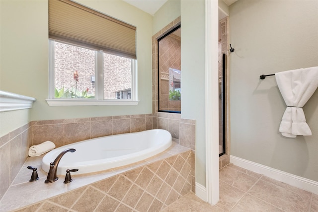 1036 Knoxbridge Rd, Forney, TX 75126 - full bathroom featuring a garden tub, tile patterned floors, and a stall shower