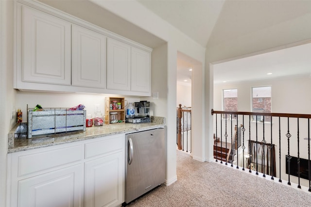 1036 Knoxbridge Rd, Forney, TX 75126 - kitchen featuring refrigerator, white cabinets, light stone countertops, and light colored carpet
