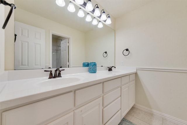 1036 Knoxbridge Rd, Forney, TX 75126 - bathroom with double vanity and tile patterned flooring