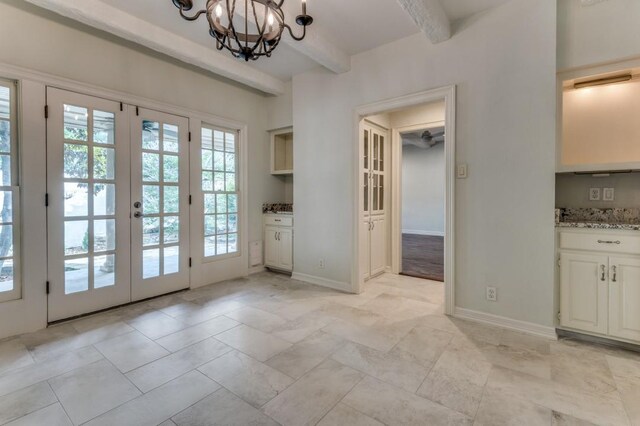 4713 N O Connor Ct, Irving, TX 75062 - doorway to outside featuring beam ceiling, a chandelier, french doors, and baseboards
