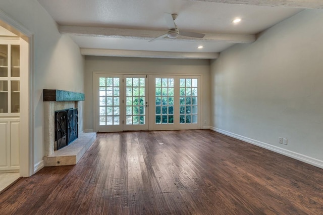 4713 N O Connor Ct, Irving, TX 75062 - unfurnished living room featuring a ceiling fan, beamed ceiling, wood finished floors, a fireplace, and baseboards