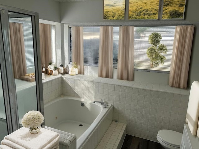 1737 Liberty Ln, Mesquite, TX 75149 - full bathroom with a tub with jets, toilet, and tile walls