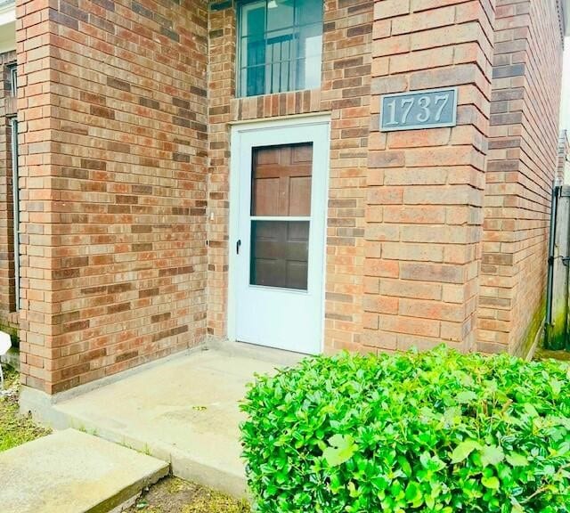 1737 Liberty Ln, Mesquite, TX 75149 - view of exterior entry with brick siding
