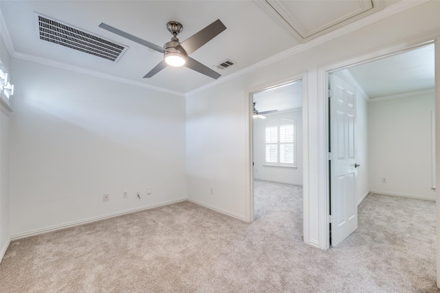 393 Bluebird Ln, Fairview, TX 75069 - empty room with light colored carpet, a ceiling fan, crown molding, baseboards, and attic access