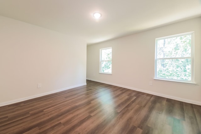 471 Bobbie St, Mabank, TX 75147 - empty room featuring baseboards, dark wood finished floors, and recessed lighting