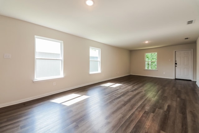471 Bobbie St, Mabank, TX 75147 - empty room featuring baseboards, dark wood-style floors, and recessed lighting