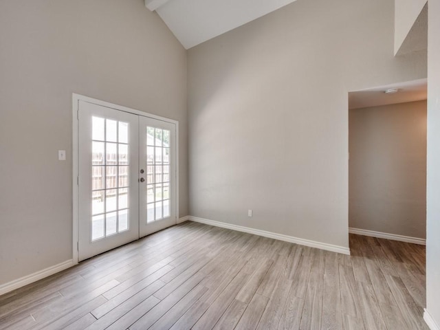 4241 Malone Ave, The Colony, TX 75056 - spare room with high vaulted ceiling, light wood-style floors, french doors, and baseboards