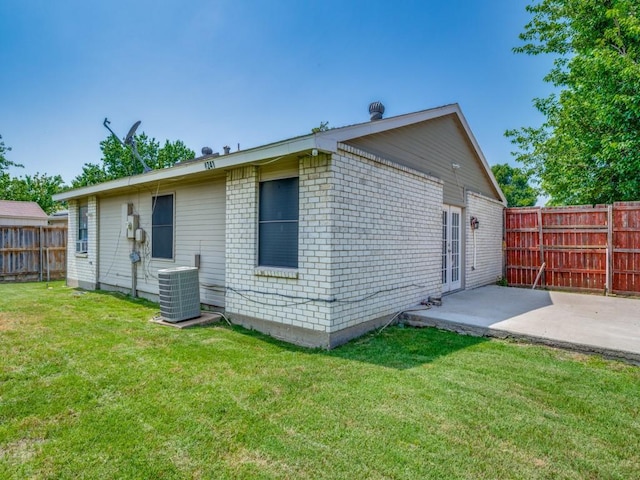 4241 Malone Ave, The Colony, TX 75056 - rear view of house with cooling unit and a patio area