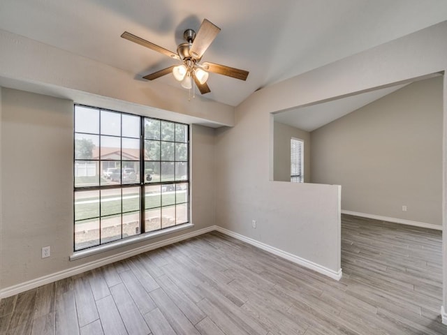 4241 Malone Ave, The Colony, TX 75056 - spare room featuring lofted ceiling, baseboards, a ceiling fan, and wood finished floors