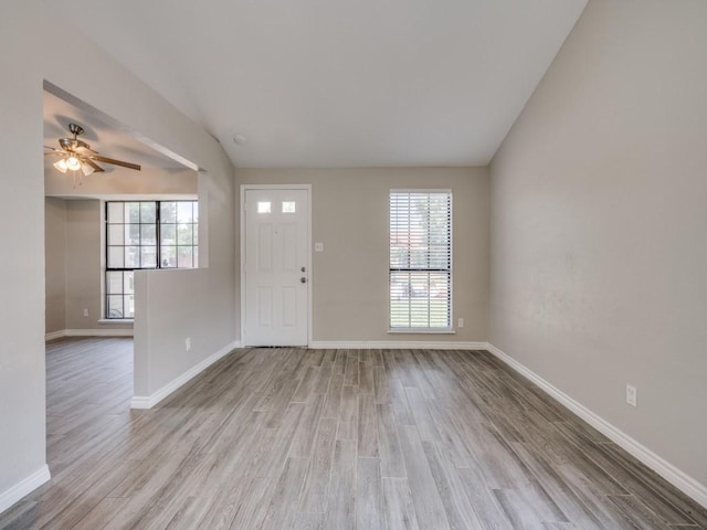 4241 Malone Ave, The Colony, TX 75056 - foyer entrance featuring healthy amount of natural light, baseboards, and wood finished floors