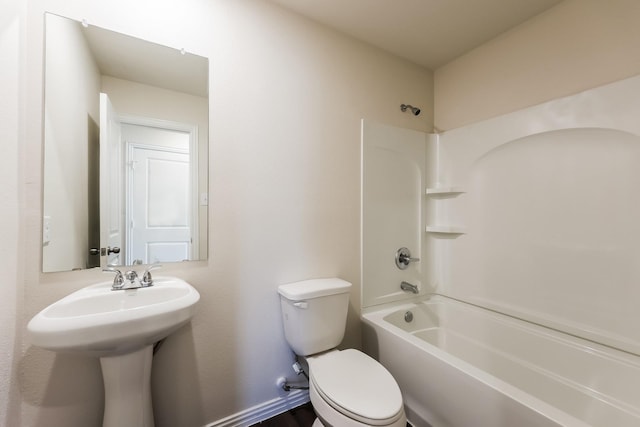825 Garrison St, Waco, TX 76704 - bathroom featuring tub / shower combination and toilet