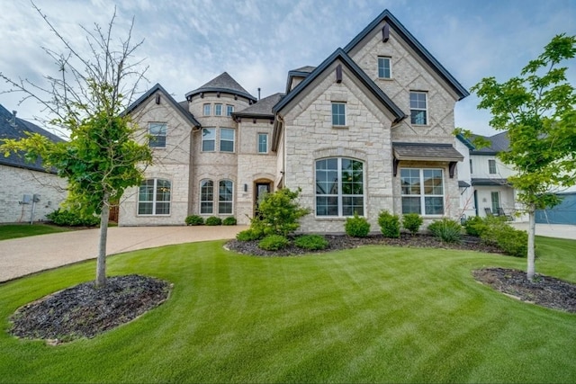 3121 Barefoot Ln, Prosper, TX 75078 - french country inspired facade with stone siding and a front yard