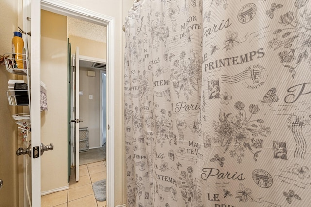 1005 Blue Jay Dr, Mansfield, TX 76063 - bathroom with tile patterned flooring and a shower with curtain