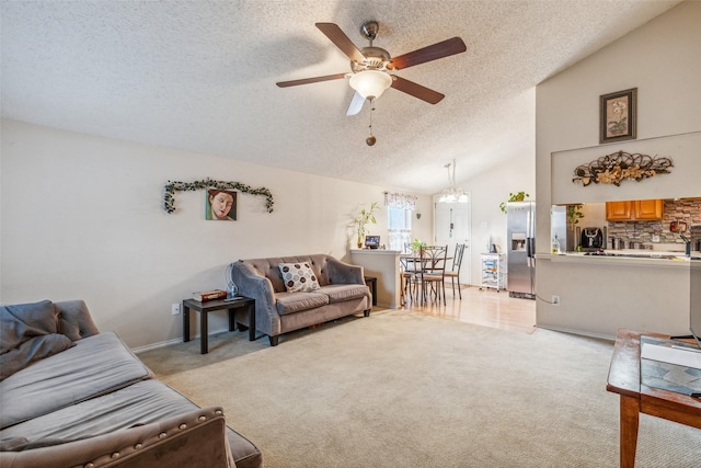 1005 Blue Jay Dr, Mansfield, TX 76063 - living room with a textured ceiling, light carpet, a ceiling fan, vaulted ceiling, and a chandelier