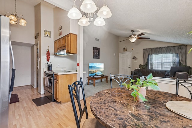 1005 Blue Jay Dr, Mansfield, TX 76063 - dining space with a chandelier, a ceiling fan, light wood finished floors, a textured ceiling, and high vaulted ceiling