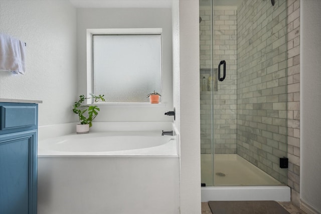 800 Bur Oak Dr, Burleson, TX 76028 - bathroom with a shower stall and a bath