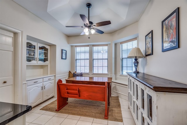 813 Singing Hills Dr, Garland, TX 75044 - office area with ceiling fan, light tile patterned floors, and wainscoting